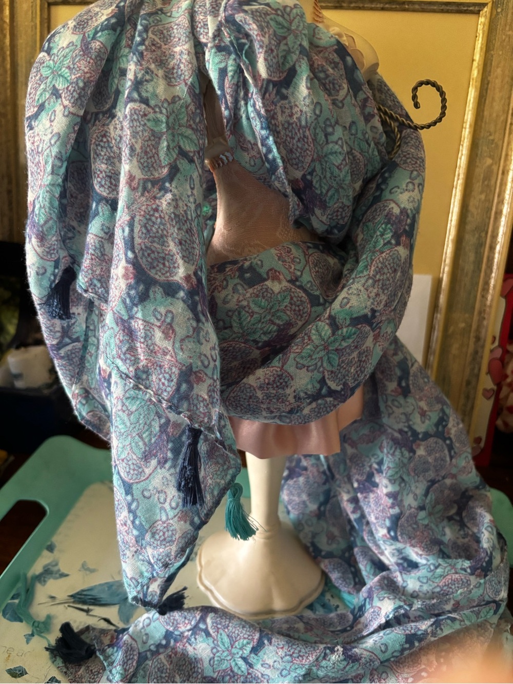 blue and purple paisley scarf delicate tassels along the edges.